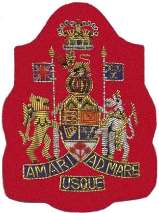 Gold embroidered chief warrant officer rank on red background.