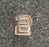 Bronze numeral 2 for the MFO medal.
