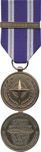 Front and back face of broze Nato medal. Also shown is the blue and white, and silver (2 stripes) ribbon and bar for Africa.