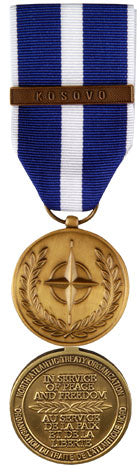 Front and back face of broze Nato medal. Also shown is the blue and white ribbon and bar for Kosovo.