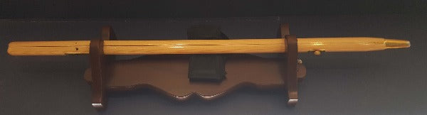 Small dark wood wall mount pace stick stand