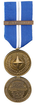 Front and back face of broze Nato medal. Also shown is the blue and white, and silver (1 stripe) ribbon and bar for Non-Aritcle 5 (Balkans)