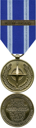 Front and back face of broze Nato medal. Also shown is the blue and white, and silver (2 stripes) ribbon and bar for NTM-IRAQ