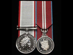 Two full size mounted medals.