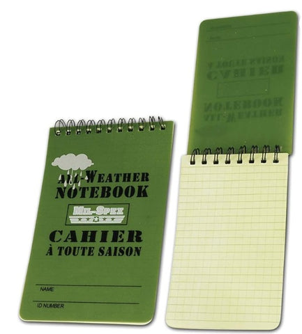 Green notebook with weather-themed design on a white background