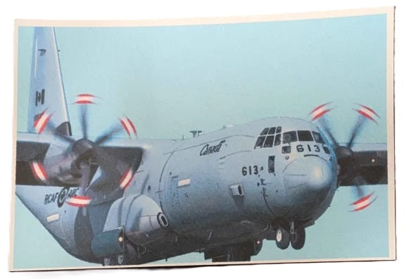 Military transport airplane with propellers on a light blue background