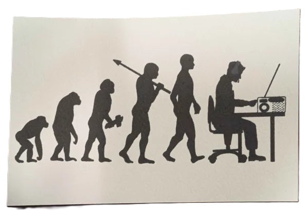 Silhouette illustration of human evolution from a primate to a person using a radio.