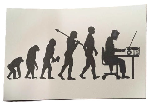Silhouette illustration of human evolution from a primate to a person using a radio.