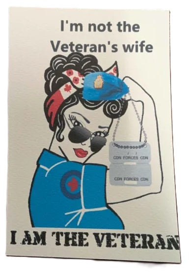 Card with illustration of a woman in air force colours and sunglasses, text 'I'm not the Veteran's wife, I am the Veteran'.