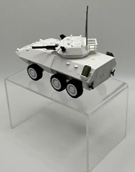 Model  AVGP Cougar of a military vehicle on a clear stand against a gray background