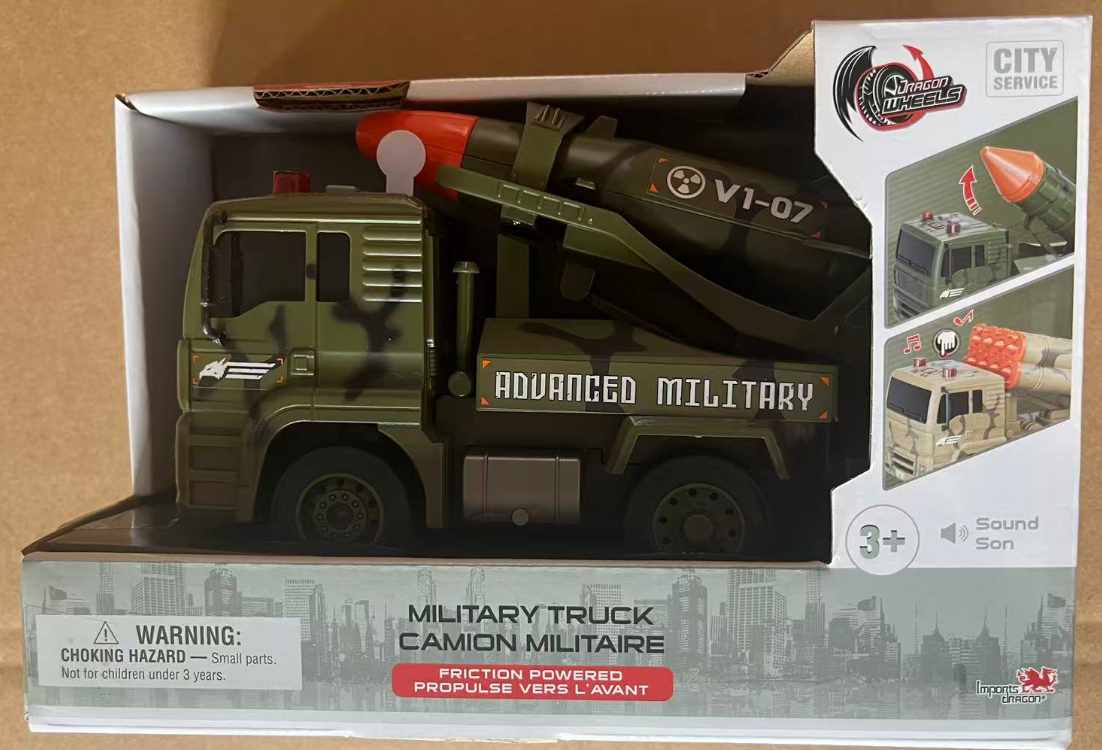 Green toy military truck with rocket launcher