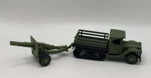 Model of a military truck with a cannon on a white background