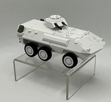 Model of a AVGP White Grizzly military vehicle on a clear stand against a gray background