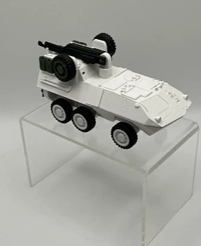 Model of a military vehicle on a clear stand against a gray background