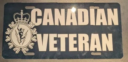 License plate with 'Canadian Veteran' text and C&E Crest on a dark background