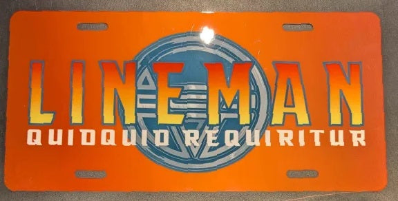 Orange license plate with 'LINEMAN QUIDQUIO REQUIRITUR' text and logo.