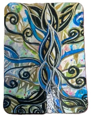 A square fabric item, likely a clutch or small bag, featuring a colorful abstract tree design with swirling branches in blue, black, white, green, and pink.