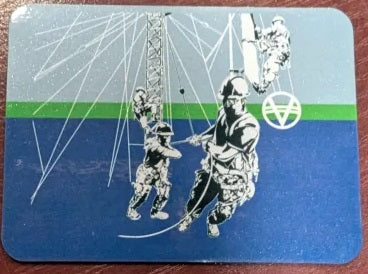 Magnet with Lineman at work with flag in background