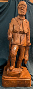 Jocelyn Caron carving of wood trapper