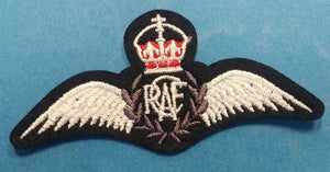 RCAF white wings with RCAF text in center and king's crown