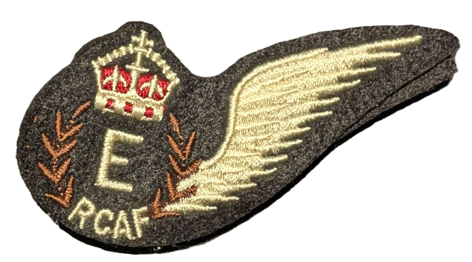 Embroidered patch with a wing design and RCAF logo on a white background