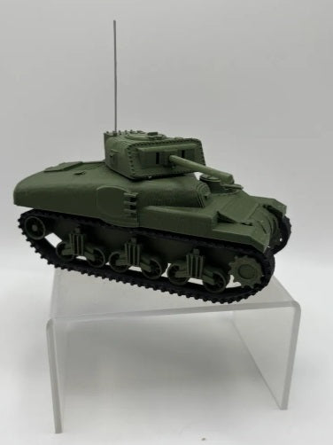 Model tank on a clear stand against a white background