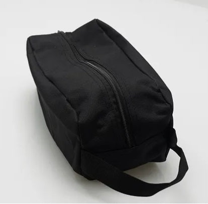 Black travel bag on a white background