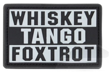 Patch with 'WHISKEY TANGO FOXTROT' text on a black background