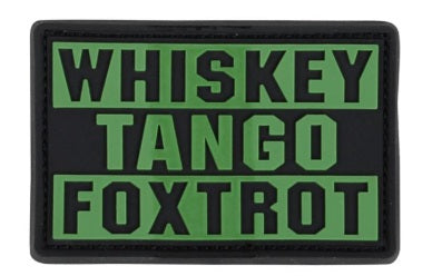 Patch with 'WHISKEY TANGO FOXTROT' text on a green background