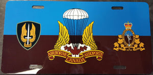 Metal License plate with airborne flag background and SSF, airborn, and RCCS Crest