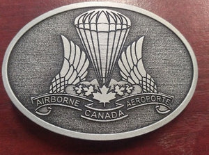 Silver belt buckle with airborne regiment crest