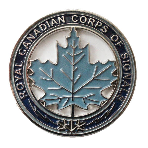 Coin with light blue maple leaf in the center and text "Royal Canadian Corps of Signals" around the rim