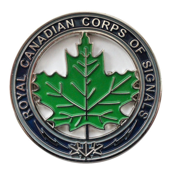 Coin with green maple leaf in the center and text "Royal Canadian Corps of Signals" around the rim