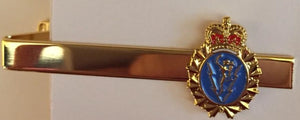Gold tie bar with C&E Crest.
