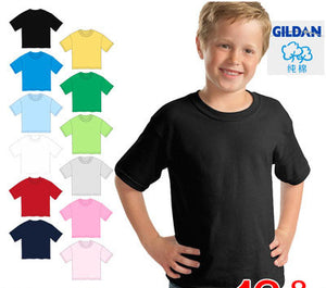 Child wearing a black t-shirt. Beside him are drawn images of t-shirts in black, yellow, two different blues, 2 different greens, white, grey, red, nacy, and 2 different pinks.