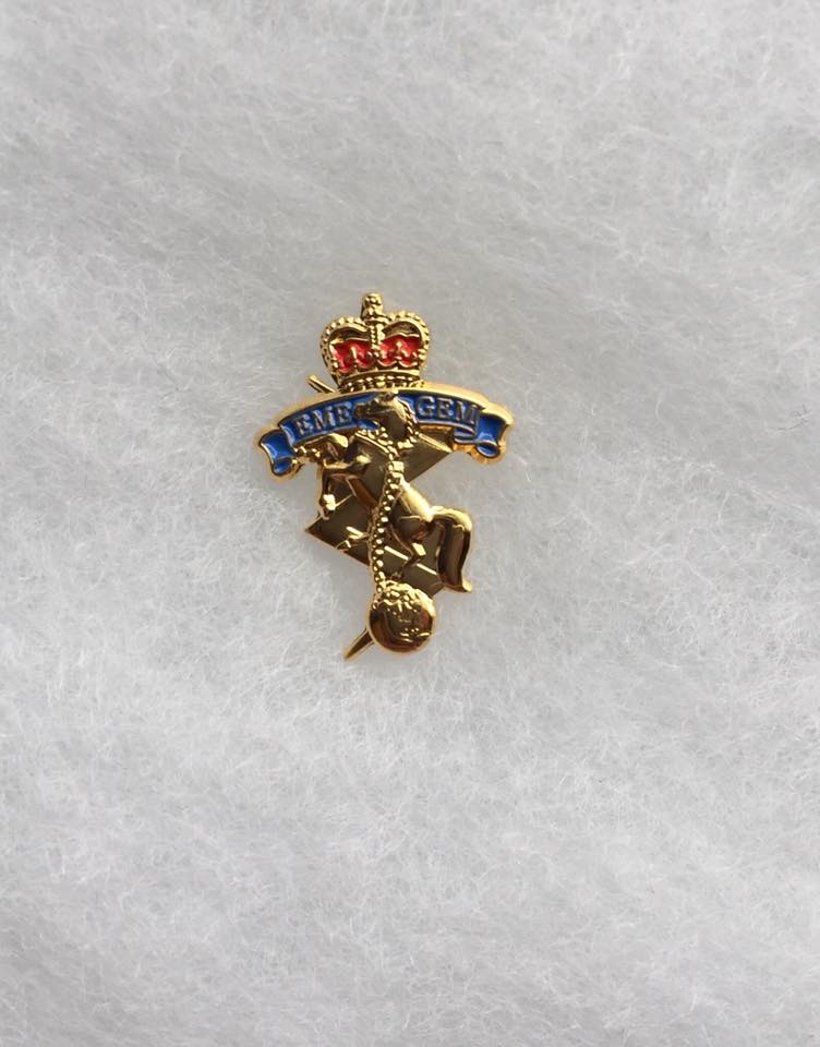 Pin in the shape of the RCEME hat badge