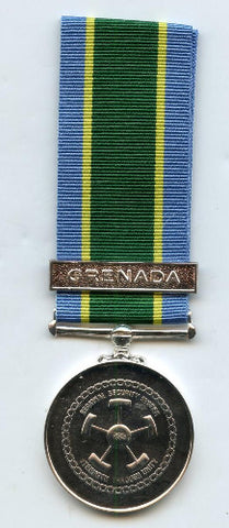 Front face of the silver Regional Security System medal featuring Grenada bar, also shown is the blue, yellow and green ribbon
