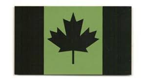 Black and green Canadian flag velcro patch. 