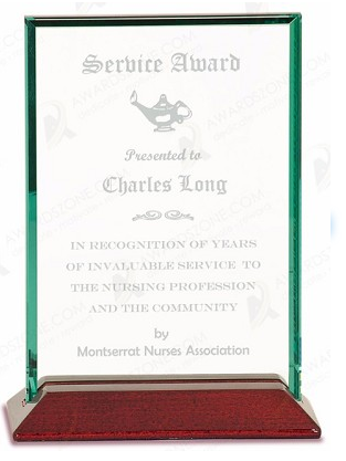 Glass award with sample text on wood base