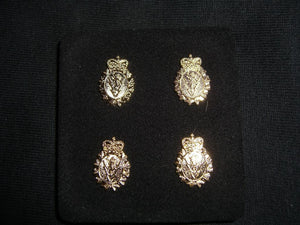 Set of four gold C&E crest cufflinks.