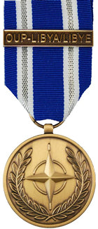 Front and back face of broze Nato medal. Also shown is the blue and white, and silver (2 stripes) ribbon and bar for OUP-LIBYA/LIBYE