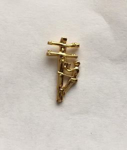 Gold lineman on a pole pin
