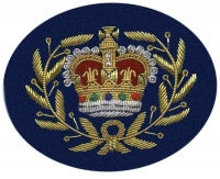Gold embroidered master warrant officer rank on blue background.
