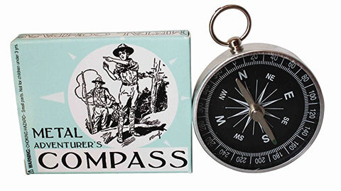 Green packaging with text "Metal Adventurer's Compass" with a metal compas next to it.