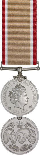 Front and back face of the silver operational service medal, also shown is the red, white, and tan South West Asia ribbon.