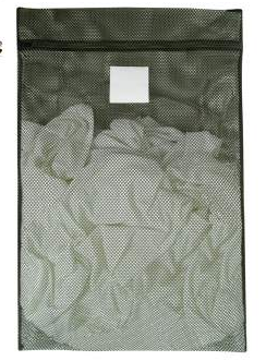 Green mesh laundry bag with white laundry inside