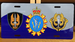 Metal License plate with curved C&E flag background and SSF, C&E, and SSF HQ Crests