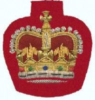 Gold embroidered warrant officer rank on red background.