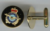 Pair of gold cufflinks featuring coloured air-ops crest.