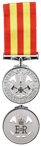 Front and back face of the silver fire service exemplary service medal, also shown is the red and yellow ribbon.